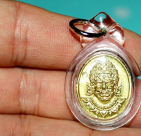 Blessing buddha Phaya Phurisart eat ghost coin by Phra Arjarn O, Petchabun